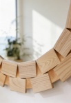 freepik__un-gran-espejo-circular-hecho-de-bloques-de-madera__27207
