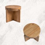 freepik__mesa-auxiliar-de-madera-natural-junto-a-sof-en-sal__79464