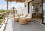 freepik__escena-terraza-moderna-estilo-tulum-2-sillones-y-m__33310
